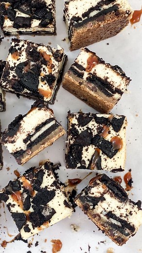 Brooke Homec | SALTED sweets on Instagram: "These Slutty Cheesecake Bars are the perfect Super Bowl treat!! Layers of cookie dough, oreos, cheesecake, more oreos & and caramel drizzle! Comment OREO and I’ll send the recipe link right to you! #thesaltedsweets #cheesecakebars #cookiebars #oreocheesecake #superbowlfood #crowdpleaser"
