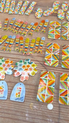 Emily Hett Art on Instagram: "Shop Update Tonight 8pm UK Time🌈 . We have worked really hard on this collection so I really hope you like all the new patterns ❤️ (mugs aren’t quite ready yet so will be coming to the next shop update) . (Also, if your wondering why I am wearing a coat, I ran to unload the kiln at 6am so the studio was freezing 😅) . . . #handmade #ceramics #pottery #glazing #kiln"