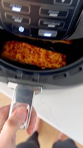 A simple recipe for air fryer salmon that results in perfectly flaky and tender salmon fillets. It’s healthy, flavorful and ready in under 15 minutes. https://www.eatingbirdfood.com/air-fryer-salmon/ | Eating Bird Food
