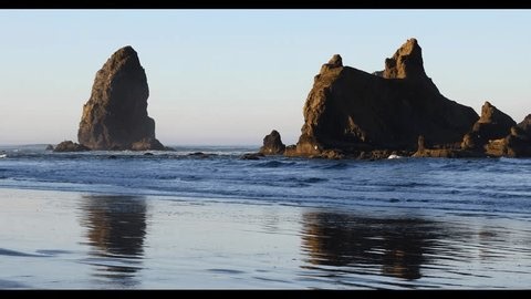 clip-3986740893-4k-serene-sunrise-video-cannon-beach-oregon