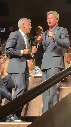 George Clooney & Brad Pitt Hug and Dance During ‘Wolfs’ Standing Ovation at Venice