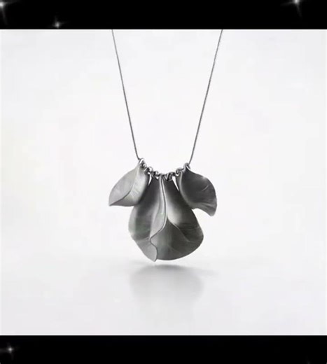 “Silver Textured Petal Layered Necklace: Minimalist Modern Statement Piece”