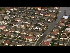 Live: Heavy rain causes flooding in Huntington Beach