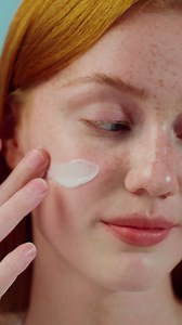 Woman Applying Face Cream | Premium Stock Video Footage
