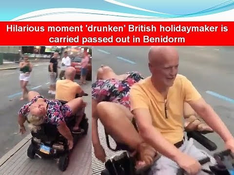 Hilarious moment 'drunken' British holidaymaker is carried passed out in Benidorm