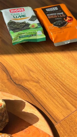 crispy spam musubi wraps 🤤 made with meijin rice paper and @nicos.snacks seaweed snacks! slice and pan fry spam until golden and crisp. for 4 oz of spam, pour in 1.5 tbsp soy sauce, 1.5 tbsp mirin, and 1/2 tbsp brown sugar and let it bubble until thick and glossy. to assemble, wet rice paper, layer on a sheet of seaweed, a scoop of rice, the glazed spam, and another piece of seaweed. wrap it up tightly and pan fry each side until perfectly crispy. #spammusubi #koreanfood #hawaiianfood #ricepape