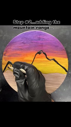 First step was a resin pour for the sunset sky, after a bit of a cure time, I added the mountain range. Some resin artists will paint then pour clear resin over their work, my ocean/mountain scapes etc are full on resin pours with no painting…. #resinaddict #resinpouring #epoxyresin #okanaganartist #cribbageboard #custommade #handmade #shopcanadian #functionalart #mountainscapes #sunsetskies | Drinks On Me - Resin Art & Wood