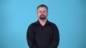 Watch how to sign 'cover-protect someone from attack by pointing a gun at someone who might shoot them' in American Sign Language.