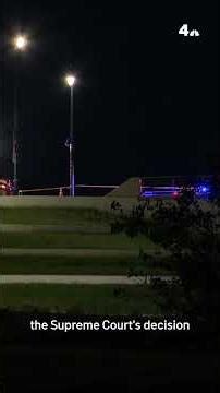 Protester remains atop Douglass Bridge more than 24 hours later | NBC4 Washington