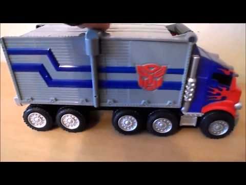 Transformers Optimus Prime Transforming Truck Into A Working Gun Toy Demostration