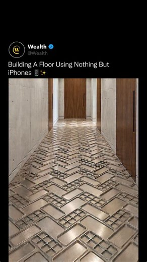 Wealth on Instagram: "This concept visualizes a hallway constructed entirely from smartphones, arranged, sealed, and reinforced as if they were architectural tiles rather than consumer devices 🧠🏗️ Each phone is treated as a modular unit. Aligned for load distribution, locked in place, and encased under a clear structural layer to simulate durability, weight resistance, and surface continuity. The idea isn’t realism. It’s scale. Concepts like this explore how technology might blur into architec