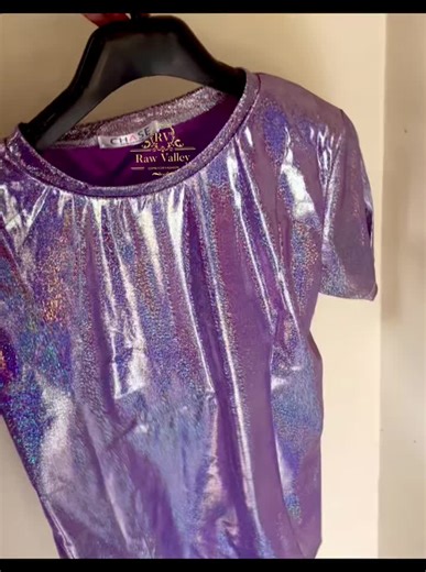 raw valley on Instagram: "Can you see the shine of this t-shirt💜💜✨😍 Raw phone camera vedio of the silver silk t shirt Most demanding silk t shirt Fabric material- polyster Colour available- *Pink 💖 *Blue 💙 *Purple 💜 *Golden 💛 * Silver 🤍 High quality Very unique outfit it will look more beautiful if you wear it enning Size information - This t shirt is free in size Upto size XL Long- 25inch Bust- elastic / 18 inch without elasticity this t-shirt is free size but will be applicable upto si