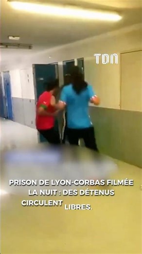 Lyon-Corbas prison filmed at night: inmates moving about freely, no guards