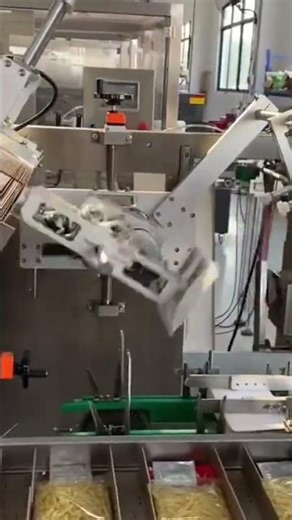 This is the appearance of an advanced machine being operated in a factory by a worker
