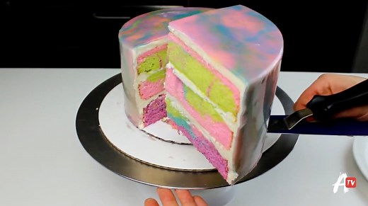 We're feeling some #TBT vibes with this groovy iridescent cake. 🌟 | AwesomenessTV