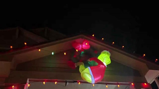 Christmas Grinch inflatable sways as wind pounds homes in Colorado