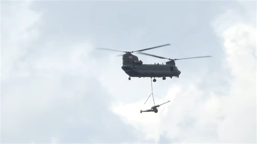 A RAF Chinook dropped heavy firepower while still in the air