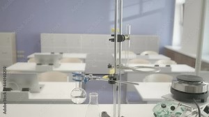 Beakers for the study of liquids and chemical processes. The concept of equipment for the Department of Chemistry and Medicine. Experiment, learning. High quality. 4k footage.