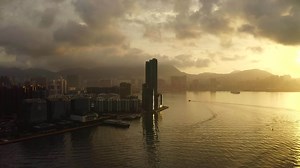 Aerial View drone 4k footage Of Modern Skyscrapers In Hong Kong City. buildings in Hong Kong city on sunrise