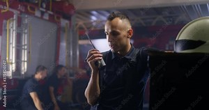 Firemen answering emergency call on station