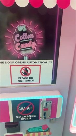 Getting Cotten candy from a machine in town