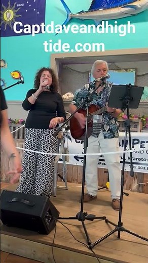 Curley and the Captain. aka Captain Dave and High Tide performing at Caribbean Pete's