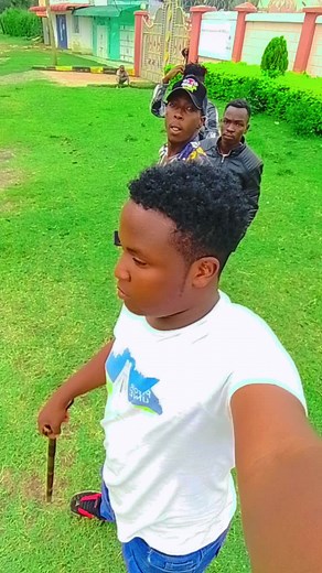Playful Outdoor Gathering of Young Men