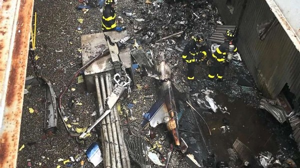 Pilot killed in helicopter crash atop New York City building was a 'true hero,' family says
