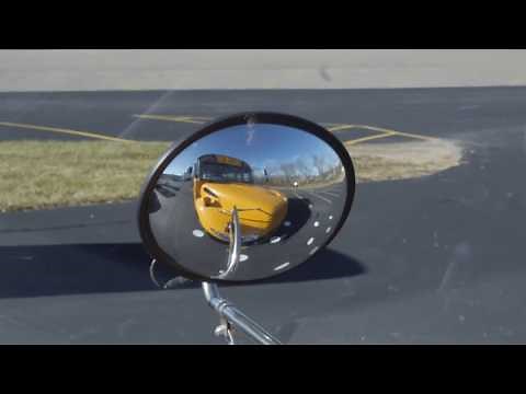 School Bus mirror adjustments with mirror grid for crossover mirrors.
