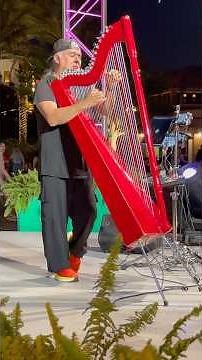 Amazing harpist Victor Espinola performs at Disney Springs! @VictorEspinolamusic #harp #harpist