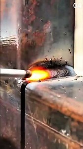 Weld bead glows—metal joins under steady torch heat