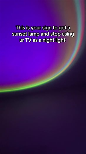 This is your side to ditch the loud overstimulating TV and grab this relaxing Sunset lamp