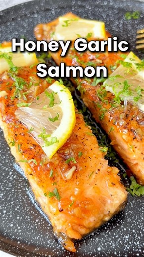 HONEY GARLIC SALMON - Garlicky, sweet, and sticky. Ready in just 15 minutes, this quick and healthy dinner tastes like a fancy restaurant meal. 😍 Recipe link in the comments. Make it tonight! #honeygarlicsalmon #salmonrecipes #easyrecipes #dinnerideas #quickmeals | Rasa Malaysia