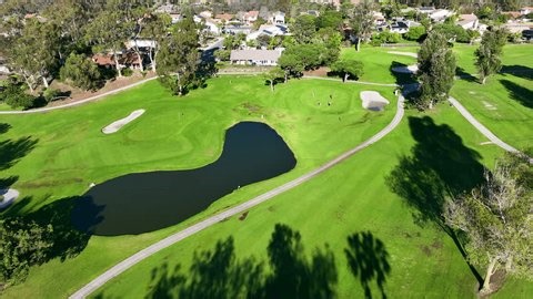 clip-4010933947-aerial-drone-video-over-golf-course-house