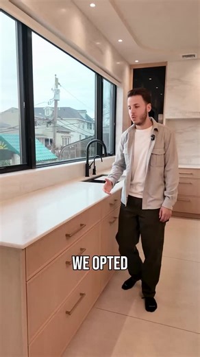 The Kitchen Guy on Instagram: "Taking the countertop stone into the backsplash and wrapping it around the window keeps everything seamless. It adds protection where you need it most and creates a cleaner, more architectural look throughout the kitchen. Save this for design details that last 🧠 Follow @thekitchenguy for thoughtful kitchen design. #kitchendesign #customkitchen #backsplashdesign #stonebacksplash #luxurykitchen #interiordesign #kitcheninspo #designthatworks #modernkitchen #highendho