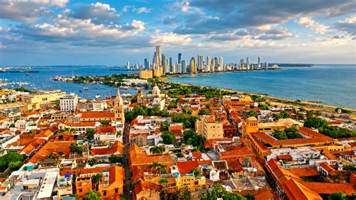 Cartagena’s old city walls standing beside modern skyscrapers