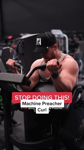 Master the Machine Preacher Curl: Proper Form & Tips