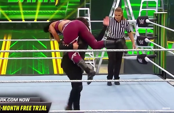 Tamina carries and spanks Bayley