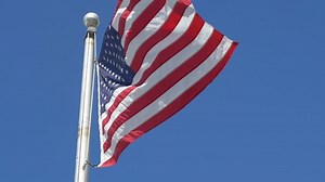 clip-1008678178-professional-video-united-states-flag-waving-wind