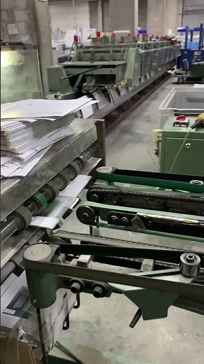 Muller Martini 335 saddle stitcher in production