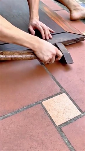 Carefully Aligning and Tapping Wooden Door Panels into Place Using a Hammer #shorts