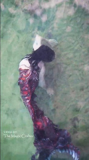 The mermaid is trying to hypnotize you. Is it working?