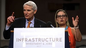 Bipartisan negotiators unveil 2,702-page infrastructure bill