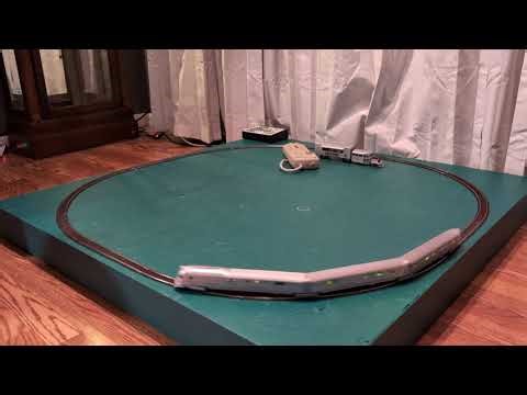 Pioneer zephyr running laps around the Christmas tree layout