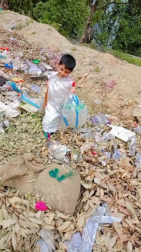 Child Sorting Through Garbage in Outdoor Environment
