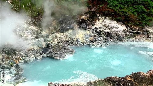Steaming hot water pond in a volcanic area, geothermal energy resource and power generation concept.