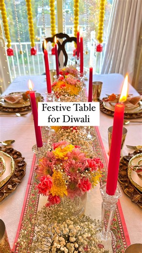 Bini on Instagram: "Diwali Dinner Table Setup I used seasonal flowers like marigolds, chrysanthemum along with carnations and baby’s breath. I always serve food as a buffet on the kitchen counter so that I can dress up the dining table. Loving the pops of colors here. Have you started decorating for Diwali? #diwali #diwalidecorations #diwalidecor #diwalitabledecor #tablescape #festivetable #indiandecor #tihar #festivevibes #diwalivibes✨ #floralarrangement #flowersofinstagram #indiandecorideas #r