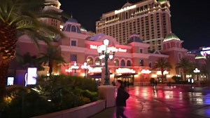 Las Vegas Hotel at Night with People Walking | Premium Stock Video Footage