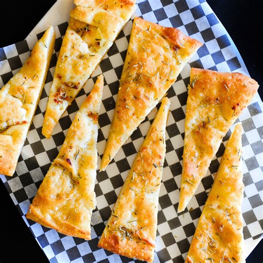 1.8K views · 14 reactions | Our rosemary bread is a timeless staple of Maria's Italian Kitchen! Crafted from homemade dough and delicately brushed with olive oil, garlic, rosemary, and kosher salt, this vegan delight is a true taste of tradition. Savor the flavors that have graced our kitchen for years! 稜 | Maria's Italian Kitchen | Facebook