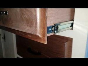 Installing soft-close ball bearing drawer slides on old drawers.